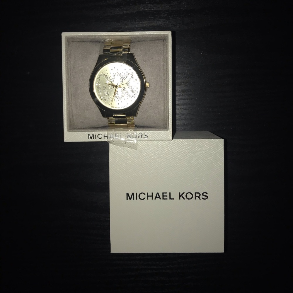 Micheal Kors gold watch w/diamond accents on face